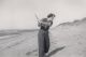 027 1940s Jean golfing on beach